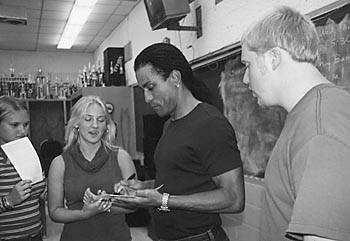 Meadows signing autographs