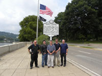 Motorcyclists documenting highway historical markers visit Archives and History Director Joe Geiger at State Capitol