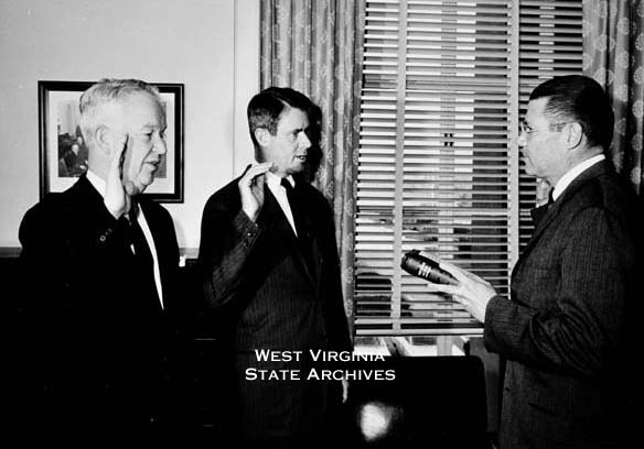 Secretary of the Army Stephen Ailes and Deputy Secretary of Defense
Cyrus Vance being sworn in by Secretary of Defense Robert McNamara