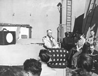 Chaplain praying for safety from enemy fire