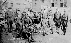 Clarence and other members of Battery C of the 315th FA. Clarence is seated on the rock. Courtesy Christopher Dunn